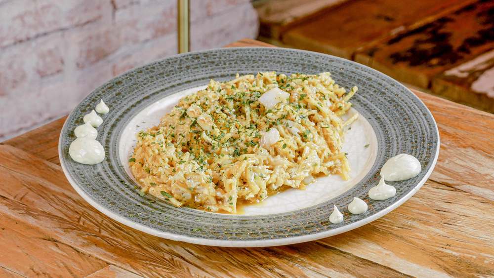 Revuelto de bacalao dorado en restaurante Madreselva Tapas Sevilla